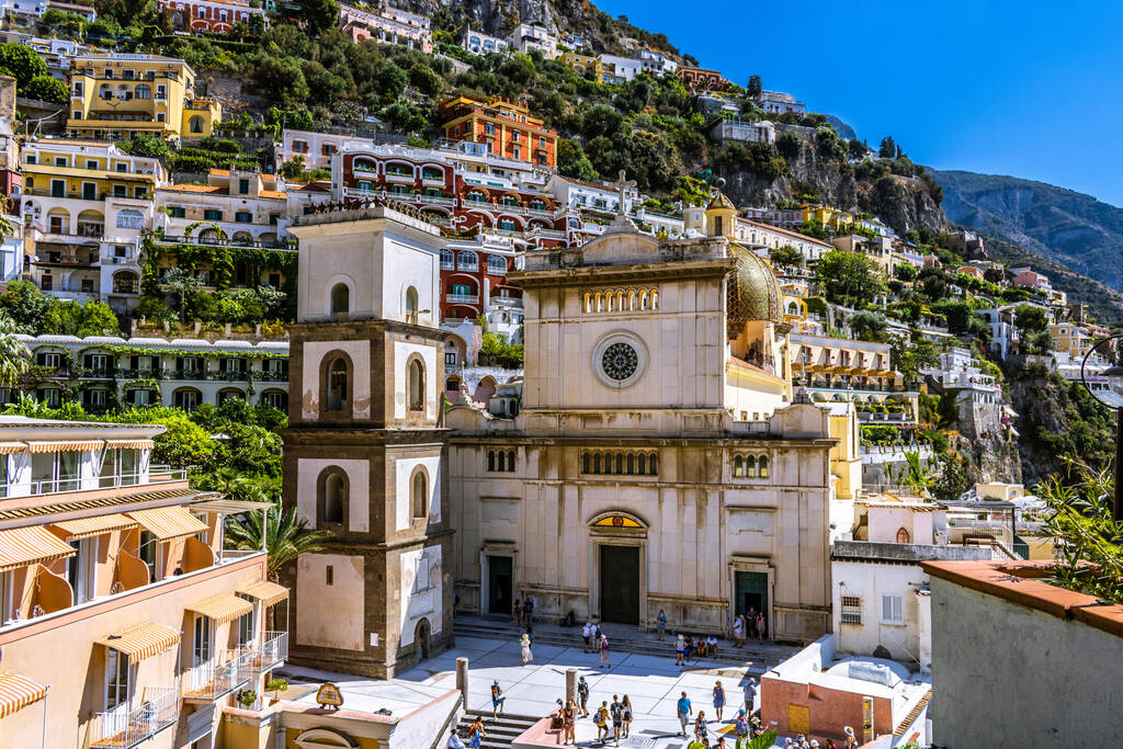 Positano, Amalfi Coast, Italy. Chiesa di Santa Maria Assunta in Positano in background.
