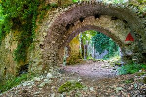 Ruins of the old paper mill in the forest in Valle delle Ferriere, Amalfi Coast, Italy