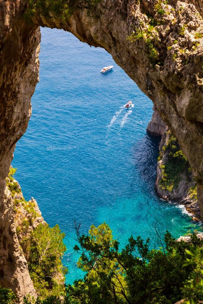 View of the Arco Naturale, a natural arch on the east coast of the island of Capri.