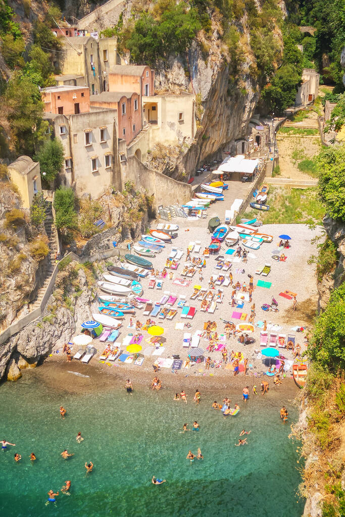 Furore forte beach, Amalfi Coast, Ravello Italy, beach photo from the viaduct at Amalfi coast ,bleu water crystal clear people swimming at Fiordo di Furore beach