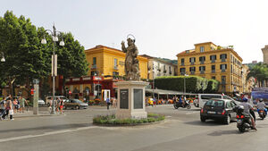 SORRENTO, ITALY - JUNE 24: Piazza Tasso in Sorrento on JUNE 24, 2014. Sant Antonino Abate monument at central place and square in Sorrento, Italy.