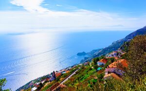 Romantic landscape on Path of Gods at Agerola village and Blue Mediterranean Sea in Italy. Italian coastline. Panorama of Amalfi coast in Europe. View of Beautiful scenery at Amalfitana. Summer day