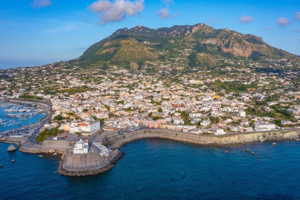 Monte Epomeo over Italian city Forio at Ischia island.