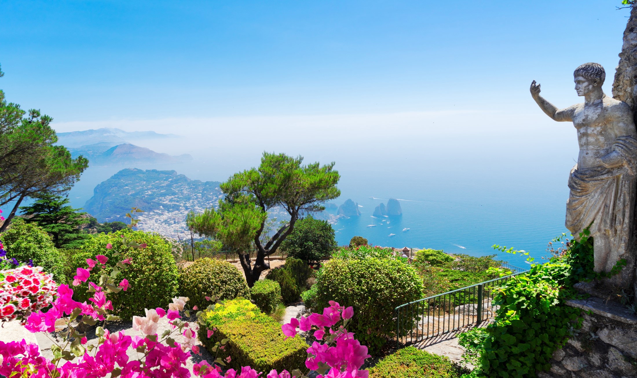 Capri atrakcje, View of sea and garden from mount Solaro of Capri island, Italy, web banner with flowers